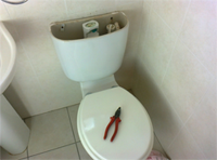 toilet repair - starting with removal of cistern